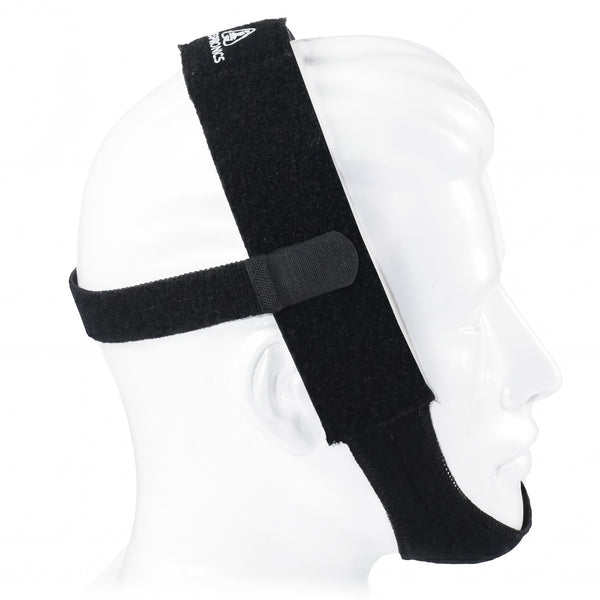 Black headgear on a mannequin head with a white background